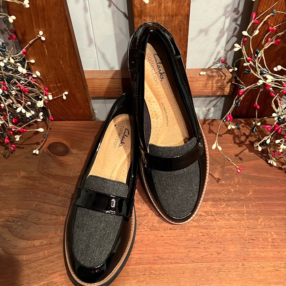 Beautiful Black patten leather with suede inlay! Clarks loafers!  Never worn!